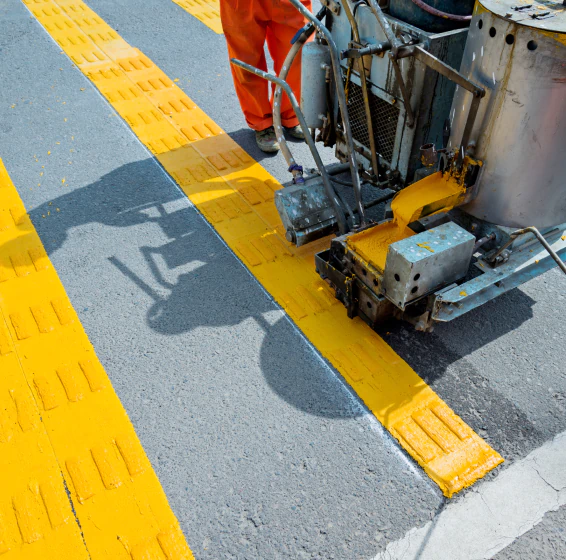 worker doing striping service